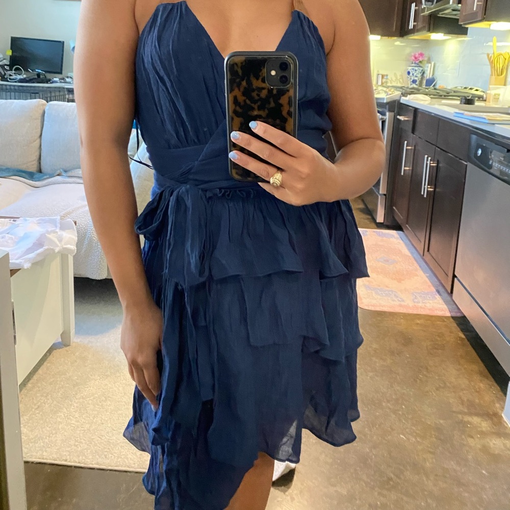 Navy ruffle wrap dress with faux leather straps